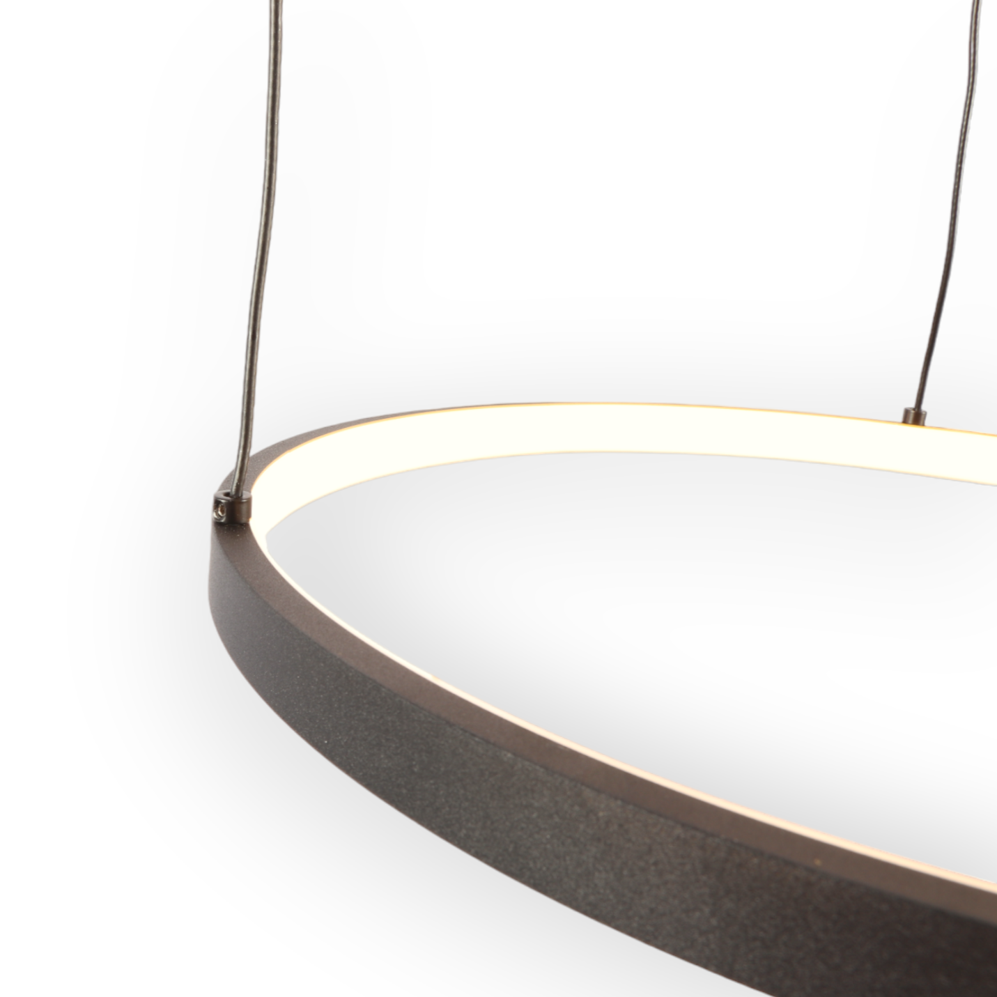 Image showcasing the Astral Trinity Chandelier with its sleek, modern design, featuring three interconnected circles elegantly suspended, casting a soothing 3000K glow in a contemporary interior setting.