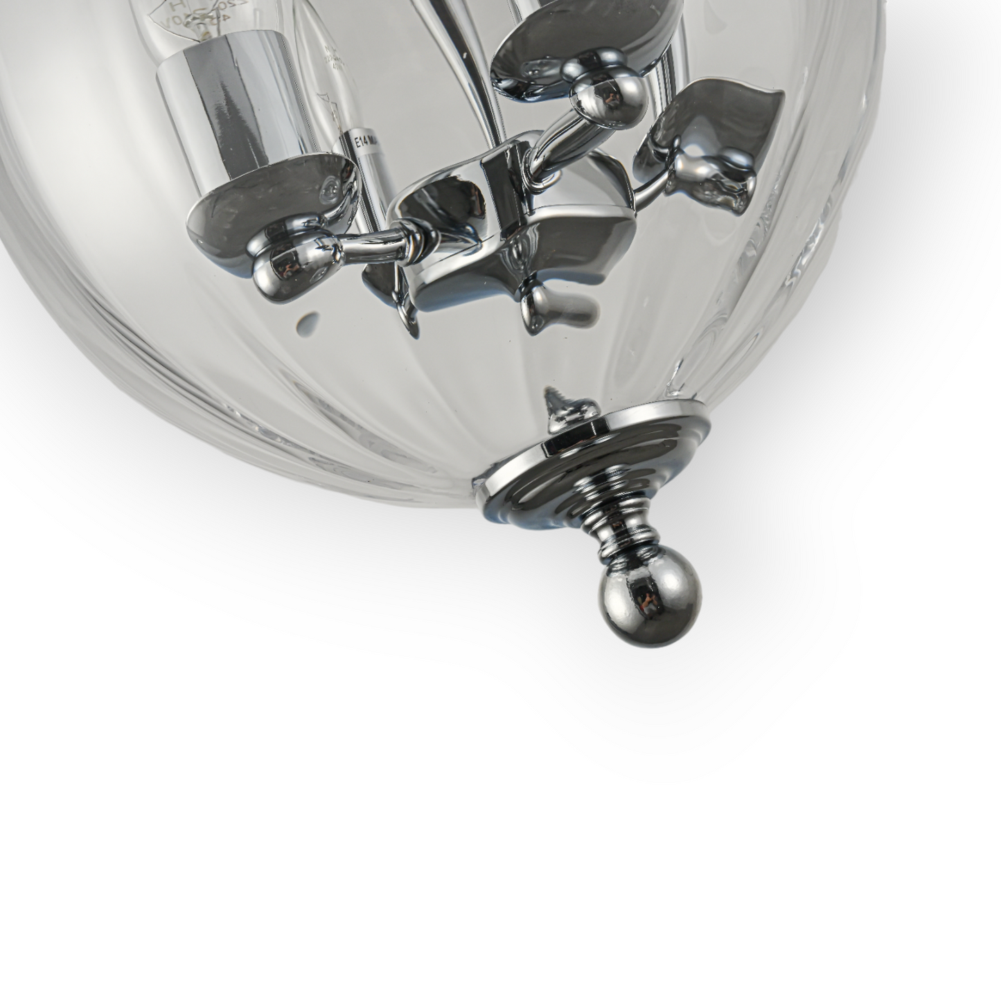 The image shows the Cape 4L Pendant, featuring a traditional bell-shaped glass enclosure suspended by a chain, with polished nickel accents and four candelabra-style lights within. This classic design merges old-world charm with contemporary craftsmanship.