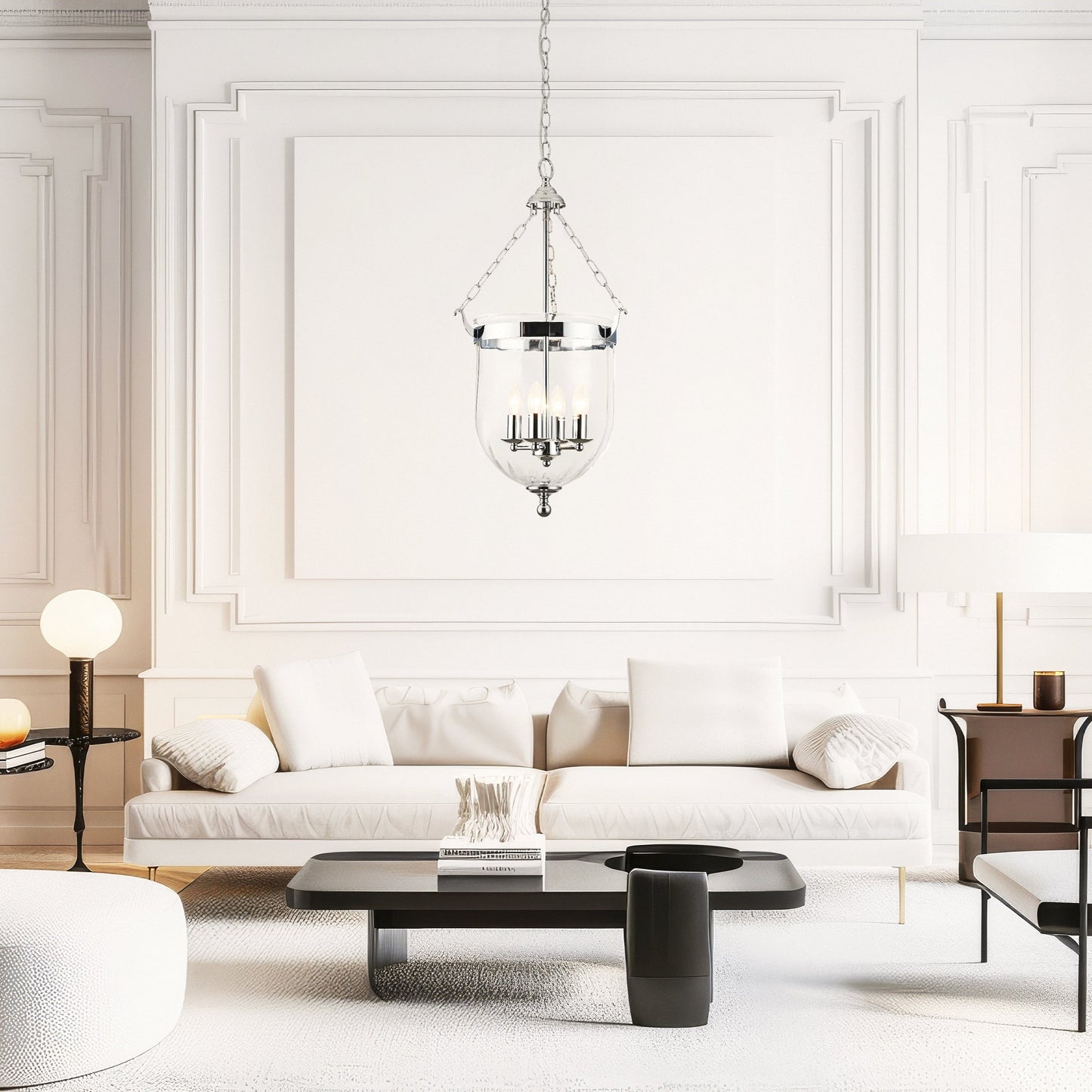 The image shows the Cape 4L Pendant, featuring a traditional bell-shaped glass enclosure suspended by a chain, with polished nickel accents and four candelabra-style lights within. This classic design merges old-world charm with contemporary craftsmanship.