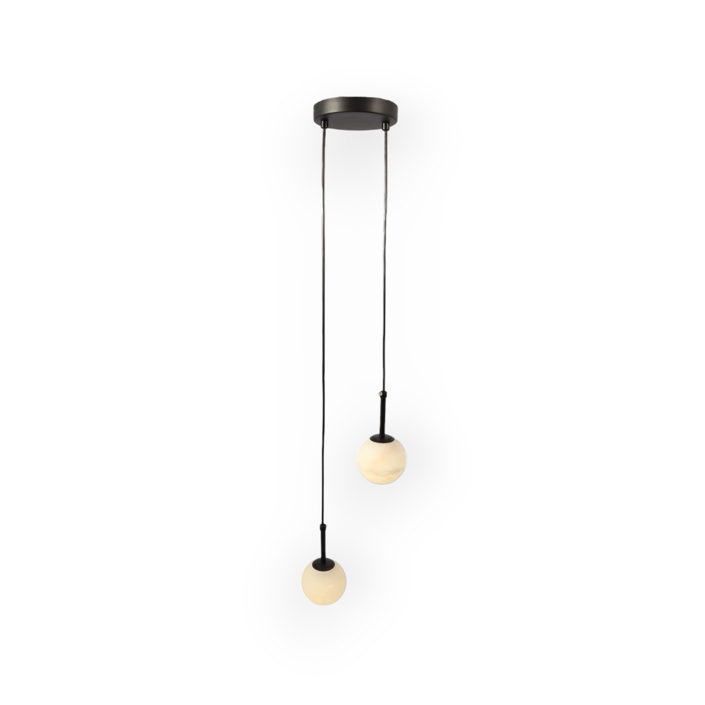 Image showing the Marble Serenade Duo Pendant, featuring lustrous black metal rods and two marble-patterned globes at varying heights, casting an enchanting radiance and creating a dynamic visual symmetry in a luxurious interior setting.