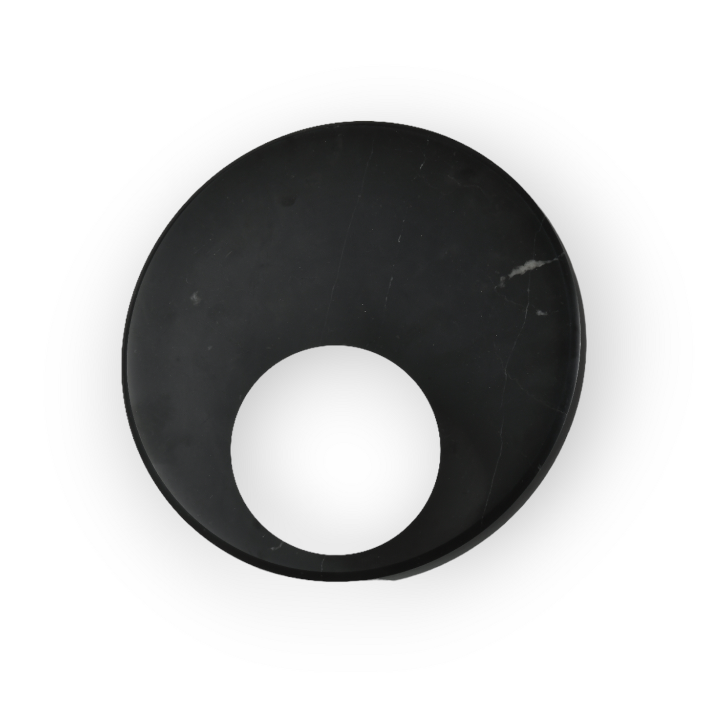 This image features the Mira Wall Light, a stunning piece with a black marble-patterned plate encircling a frosted glass sphere. The design marries natural stone textures with contemporary lighting for an elegant and striking visual effect.