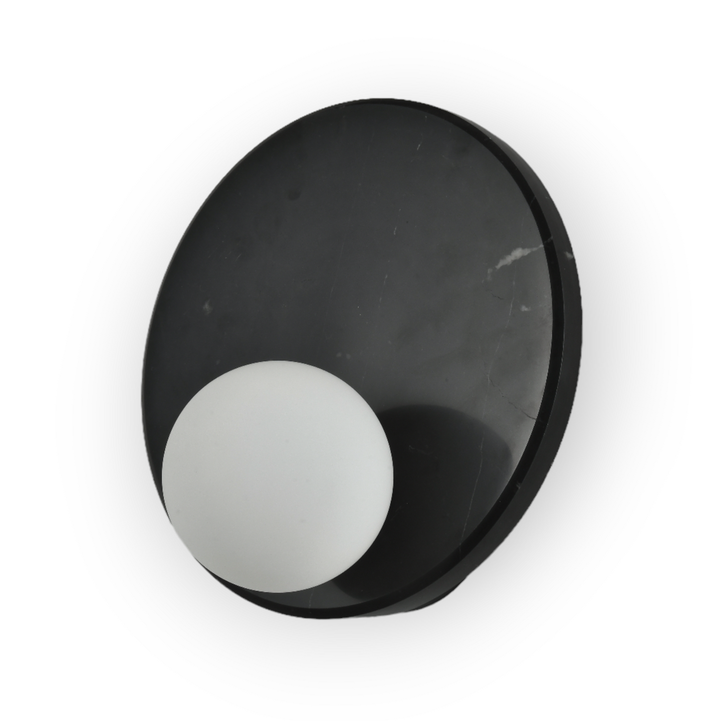 This image features the Mira Wall Light, a stunning piece with a black marble-patterned plate encircling a frosted glass sphere. The design marries natural stone textures with contemporary lighting for an elegant and striking visual effect.