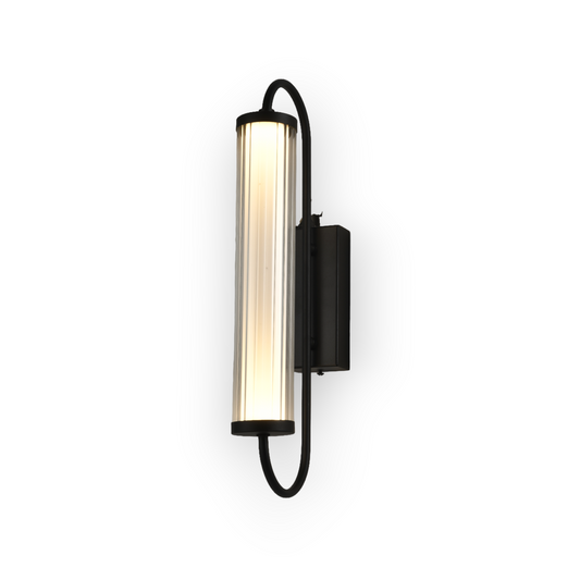 The image presents the Aster Wall Light, featuring a long, cylindrical ribbed glass shade held by a curved matte black metal bracket. The design combines industrial elements with a touch of modern simplicity, perfect for adding character to any room's wall lighting.
