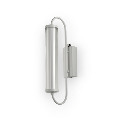 The image presents the Aster Wall Light, featuring a long, cylindrical ribbed glass shade held by a curved matte black metal bracket. The design combines industrial elements with a touch of modern simplicity, perfect for adding character to any room's wall lighting.