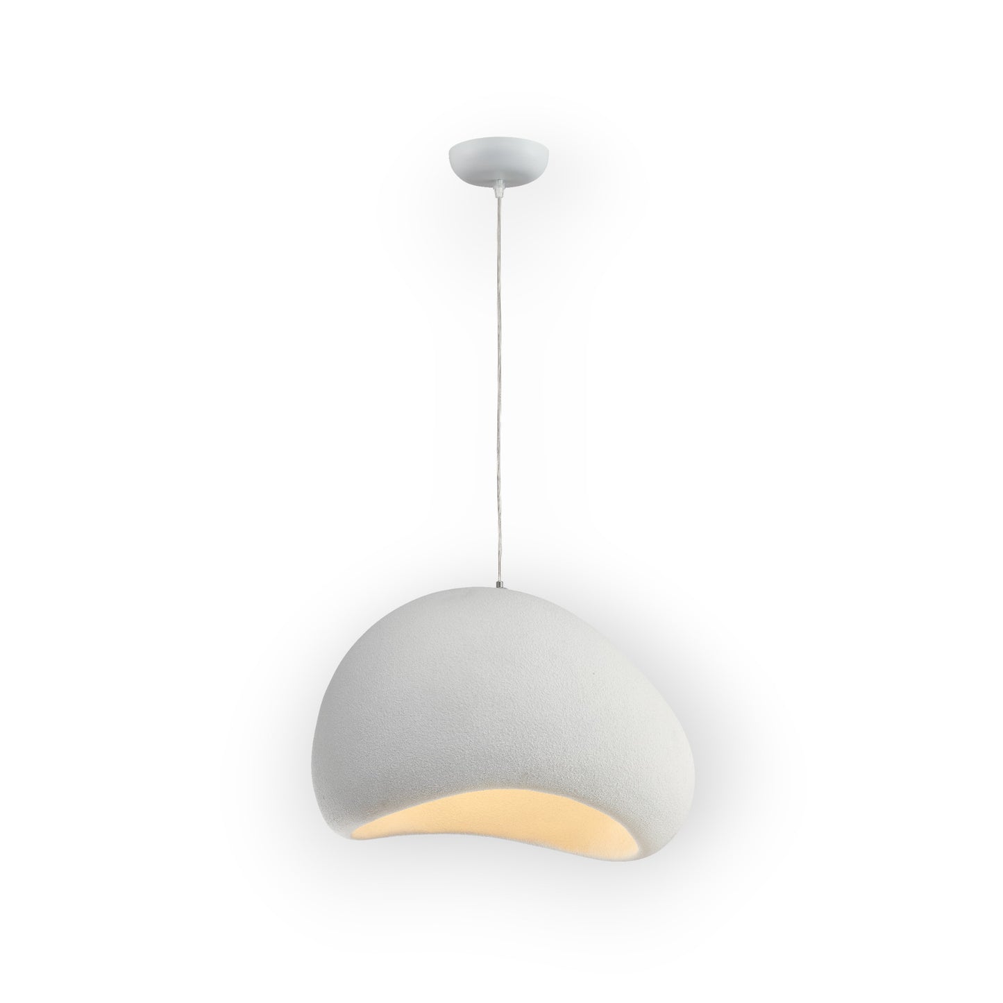 The image features the Cove Pendant, displaying a unique semi-circular design with a textured matte finish and a warm, golden interior glow. This modern pendant light is suspended from a slim cable, offering a blend of contemporary style and cozy illumination.