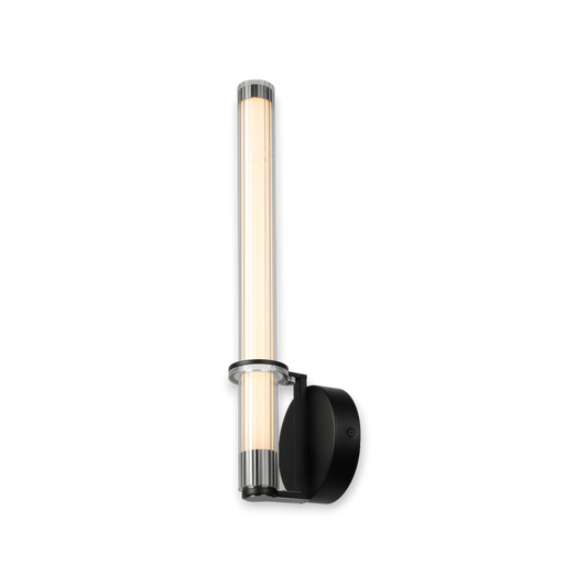 This image showcases the Leda Wall Light, a contemporary LED fixture with a refined vertical tube design and striking metallic finish, mounted against a sleek black bracket, perfect for adding a touch of minimalist sophistication to any interior.