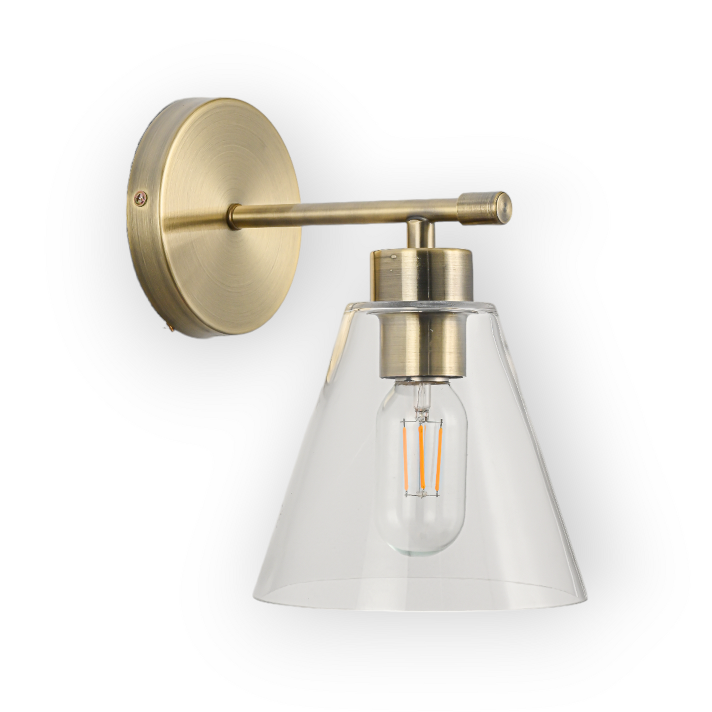 Image displays the Leo 1L Wall Light, featuring an elegant clear glass shade with a vintage-inspired Edison bulb, all complemented by a warm brass arm and round mounting plate. Its timeless design enhances any classic or transitional décor.