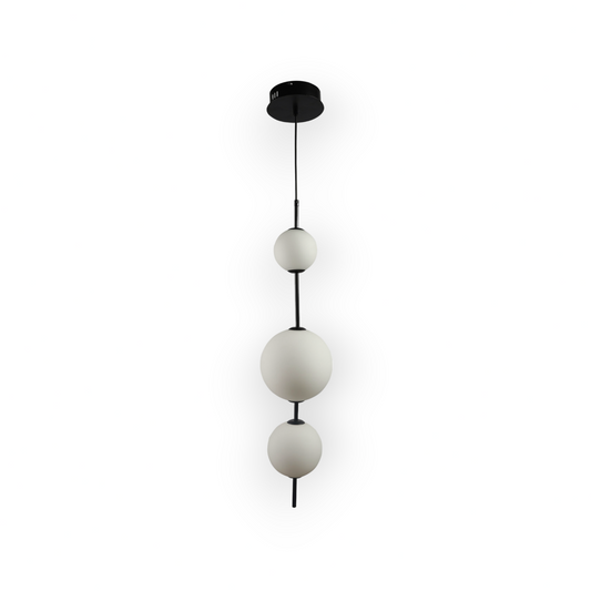 The image depicts the Opal Small 1L Pendant Light, an elegant vertical cascade of graduated opal spheres. This linear piece combines the simplicity of geometric forms with the softness of the diffused light, perfect for modern interiors.