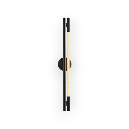 Capture the modern aesthetic of the Soren Linear Wall Light, showcasing a slender black support with a gracefully spiraled golden cord. This wall light melds functional lighting with sculptural form, perfect for contemporary interiors.